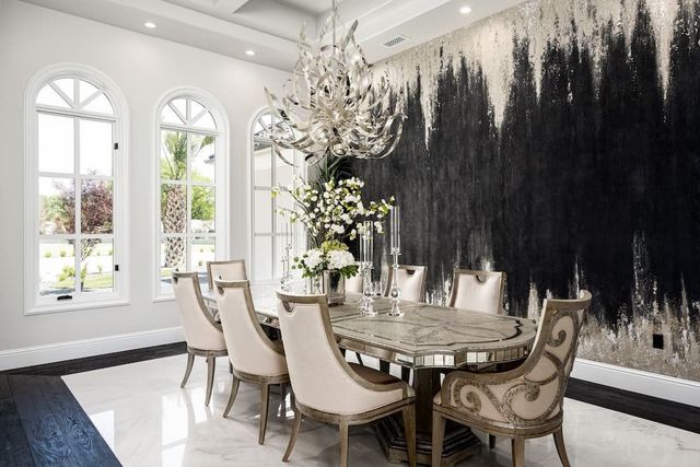 Feature wall with bold patterned wallpaper in a New York home