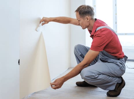 Wallpaper removal and surface preparation before new installation