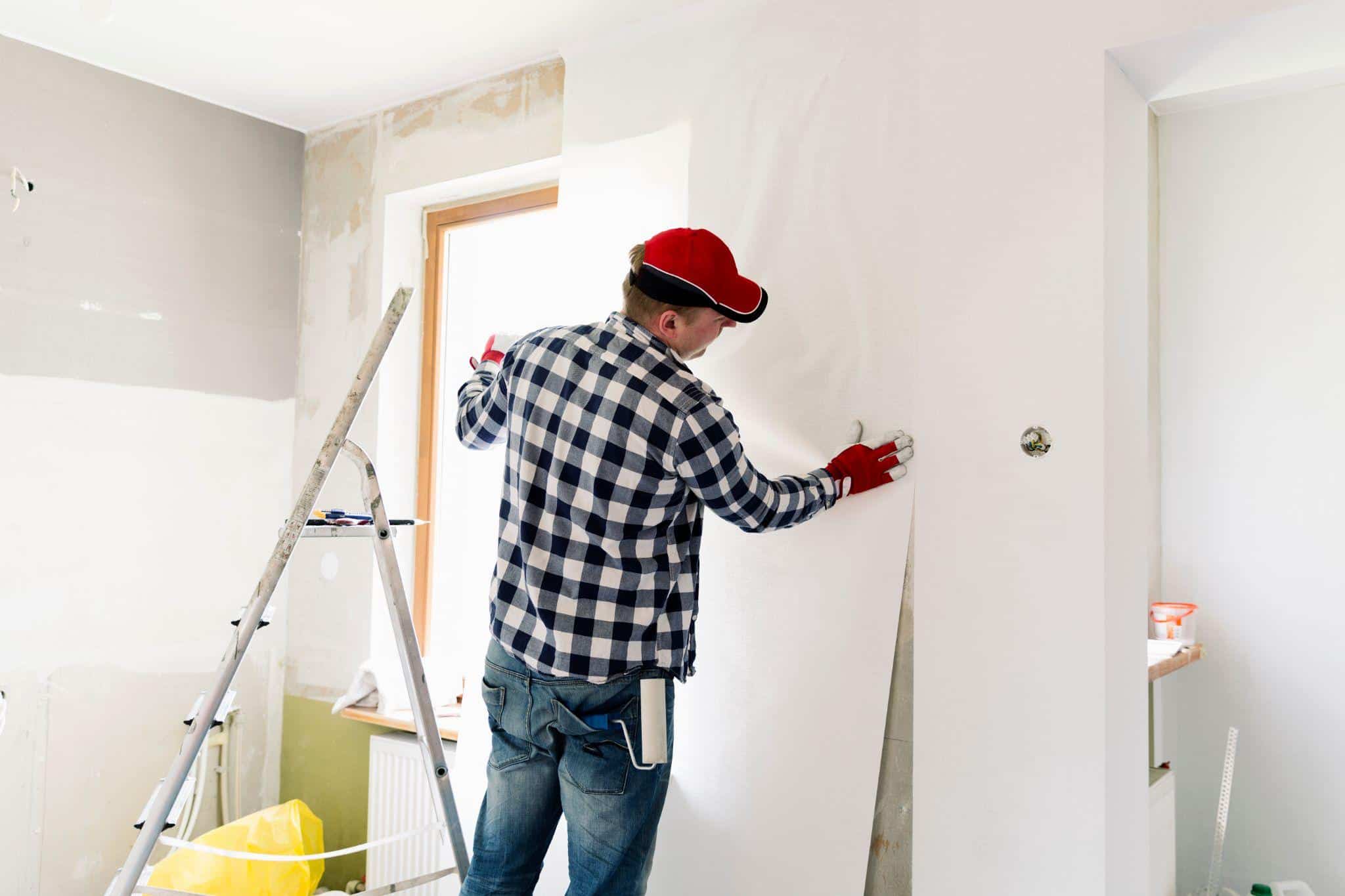 Professional wallpaper installation tools and workspace setup